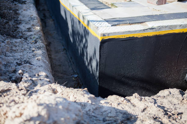 Professional Wet Basement Repair technician working in Osseo, MI